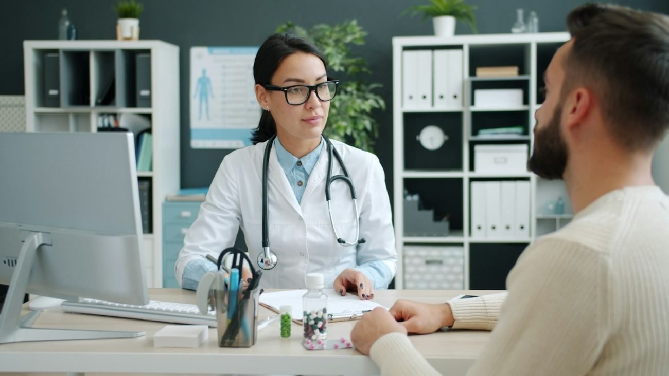 Doctor talking with a patient